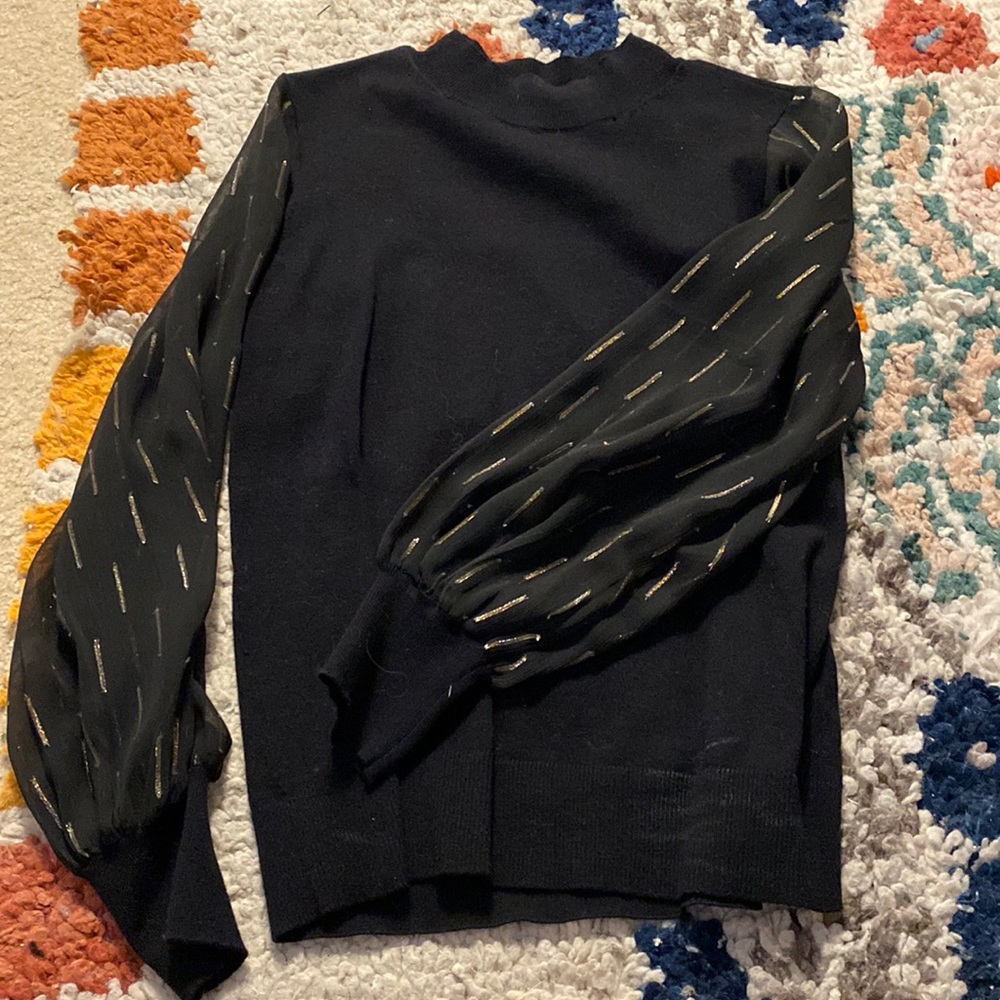 Black sweater with see through sleeves